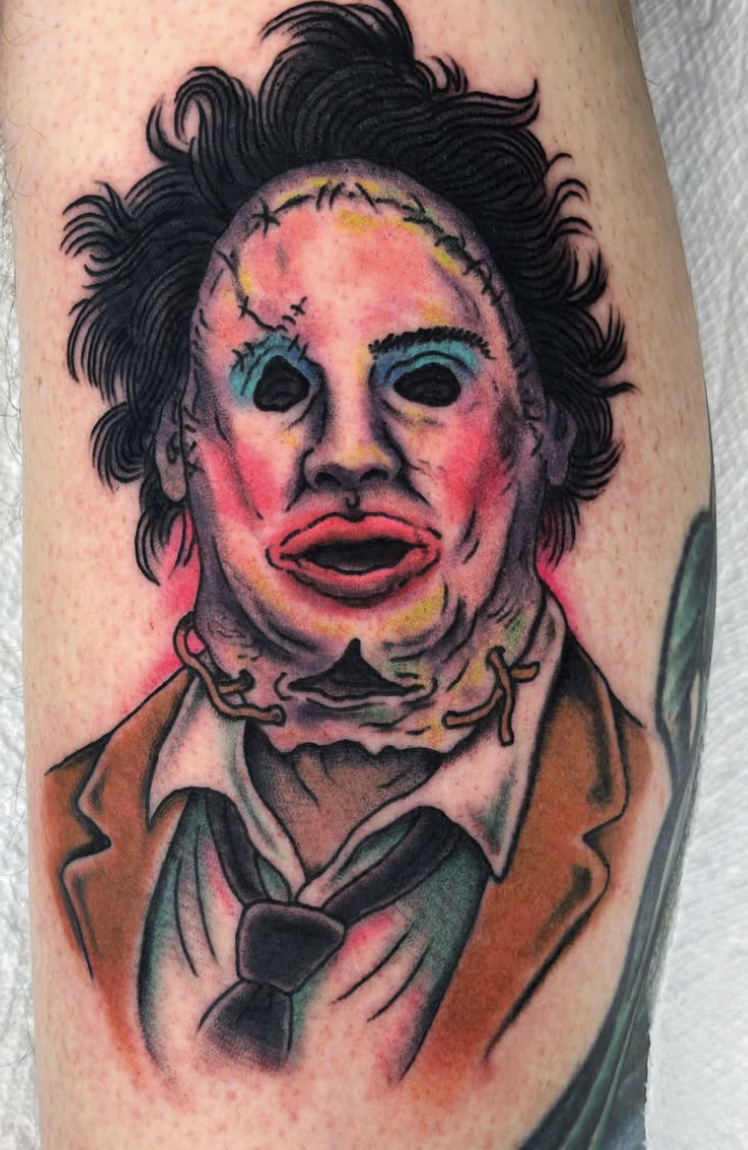 Colorful Leatherface portrait tattoo