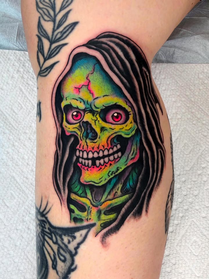 Neon hooded grim reaper tattoo