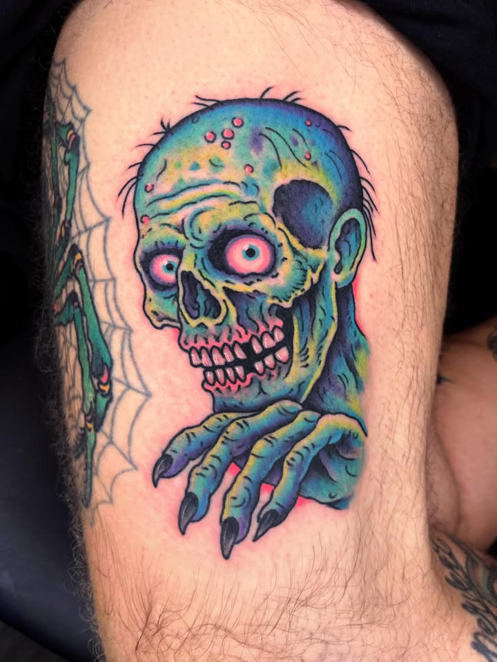 Cartoon zombie with eyepatch tattoo