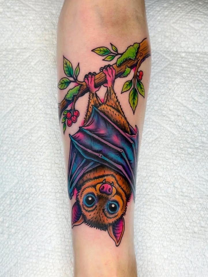 Cute hanging bat tattoo