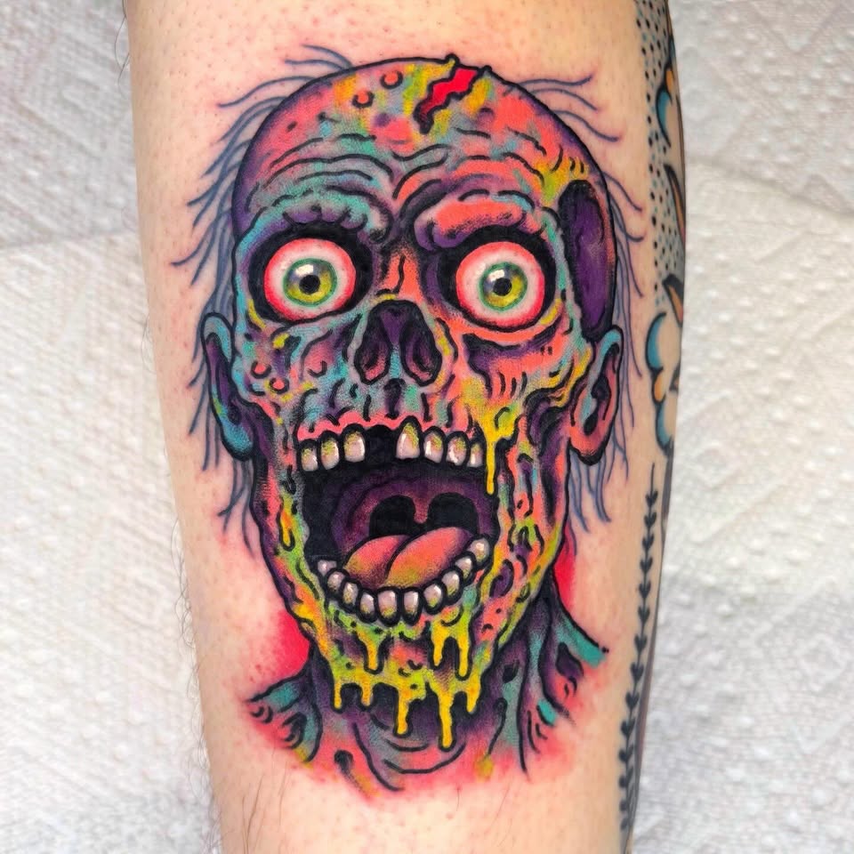 Dripping neon zombie face tattoo