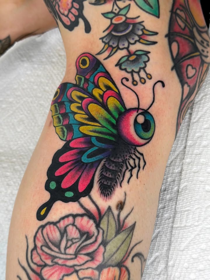 Eyeball butterfly tattoo